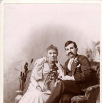 Mary Brechet Mann & husband seated