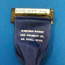 A. O. U. W. 1933 badge, reverse