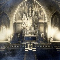Unknown priest lying in state in unknown church