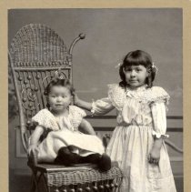 2 unknown young children.