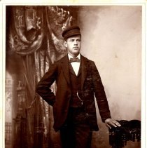 Unknown young man dressed in a 3 piece suit