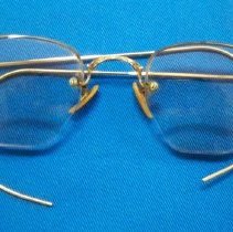 Gold wire rimmed glasses
