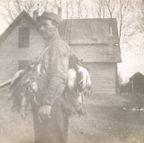 Charles Beihoffer with ducks & gun