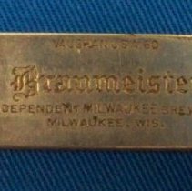 Metal can/bottle opener