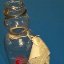 Quart glass cream bottle with spoon