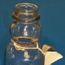 Quart glass cream bottle with spoon