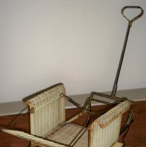 Loom woven wicker baby stroller