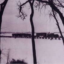 Luce Line train crossing lake (Winsted?)