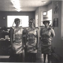 3 women in costumes