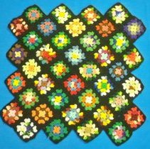 Crocheted granny square pillow cover