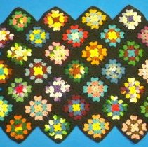 Crocheted granny square pillow cover