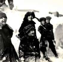 Children near snow bank, Hutchinson, MN-1924