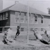 District 11 Children on May Pole Swing