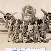 10 Army Airmen in front of an airplane