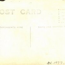 S. G. Anderson holding a large trophy cup, reverse