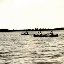 Two canoes on a lake