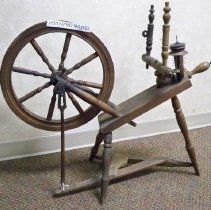 Wooden spinning wheel