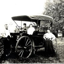 Early automobile & unidentified occupants