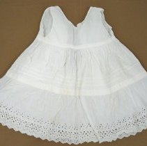 Child's white eyelet full slip
