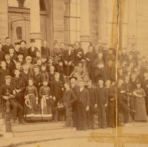 Students on steps of unknown building