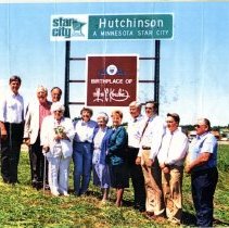11 Standing by Hutchinson Star City-Les Kouba road sign