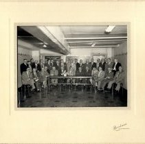 Men celebrating the birthday of Dr. E.W. Lippman 2-15-1956