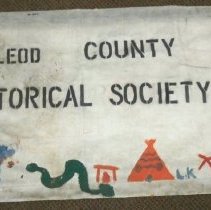 Hand painted sign for the museum