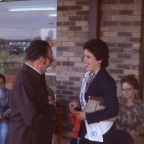 1979 Hutch Water Carnival candidate Julie Gobell visits with spectator