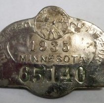 Metal chauffeur's badge