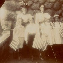 Jennie Brechet and family members outside Brechet house