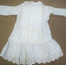 Child's short white cotton dress