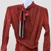 Ladies rust colored crepe dress