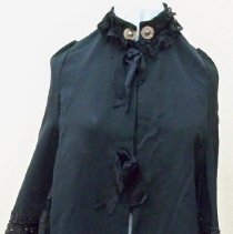 Black faille cape with black lace trim