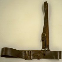 Wide brown leather belt with shoulder strap