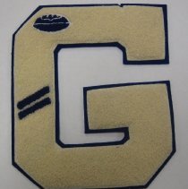 Felt G with football and two lines