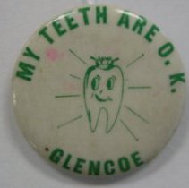 White button with green lettering