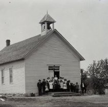 Unidentified schoolhouse & students