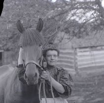 Young woman and horse