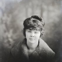 Unidentified young woman in coat