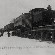First Luce Line train crossing bridge over Winsted Lake