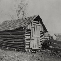 Fred Brose's log corn crib at Long Acres
