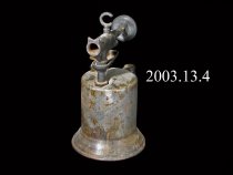 Blow torch -used to heat thick paint on boats so that it could be scraped