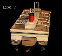 Wooden model of passenger and car ferry.  Battery operated.