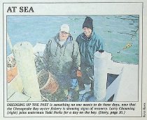 Photo of Todd Parks and Larry Chowning in Park's boat