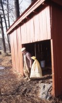 Wilson Rpwe next to his shed