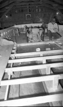 Wooden deadrise under construction  in Grover Lee Owen's shop, showing engi