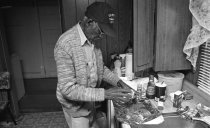 Maxwell Chandler preparing to cook muskrat