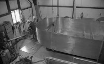 Workers next to purse boat under construction at Zapata Haynie in Reedville