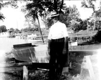 John E Wright with Skiff on Jackson Creek Photo