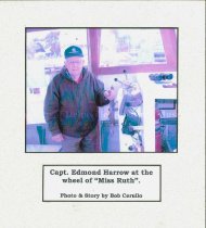Capt. Edmond Harrow at the wheel of Miss Ruth Photo